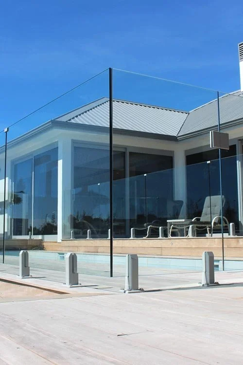 Pool fencing with glass balustrades